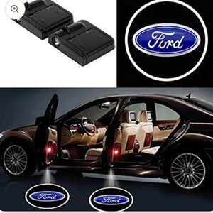 Two Ford car door logo lights
